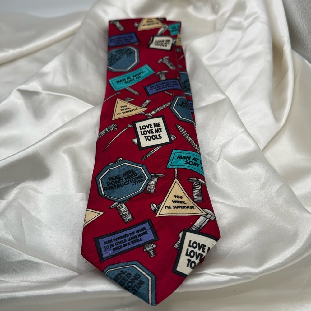 “Home Improvement" Tie with funny signs, nuts and screws.